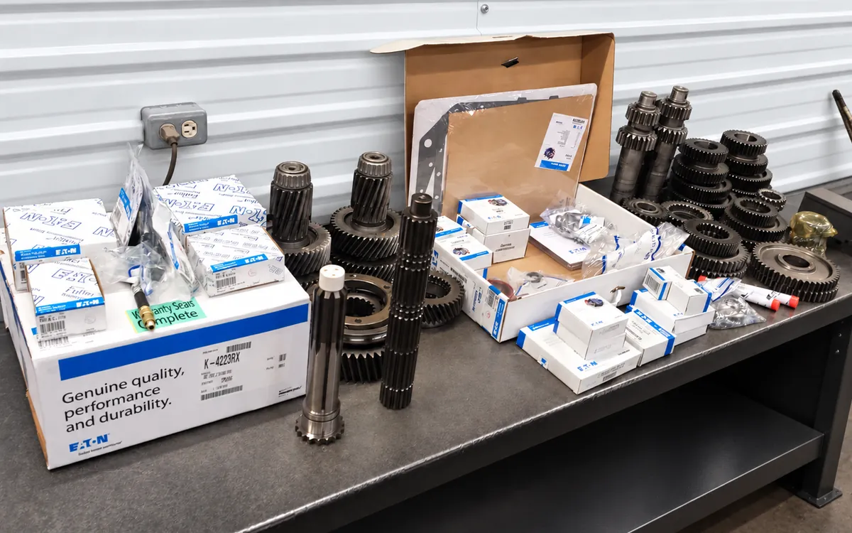 Eaton transmission rebuild kit laid out on the bench: gears, shafts, bearings and seals